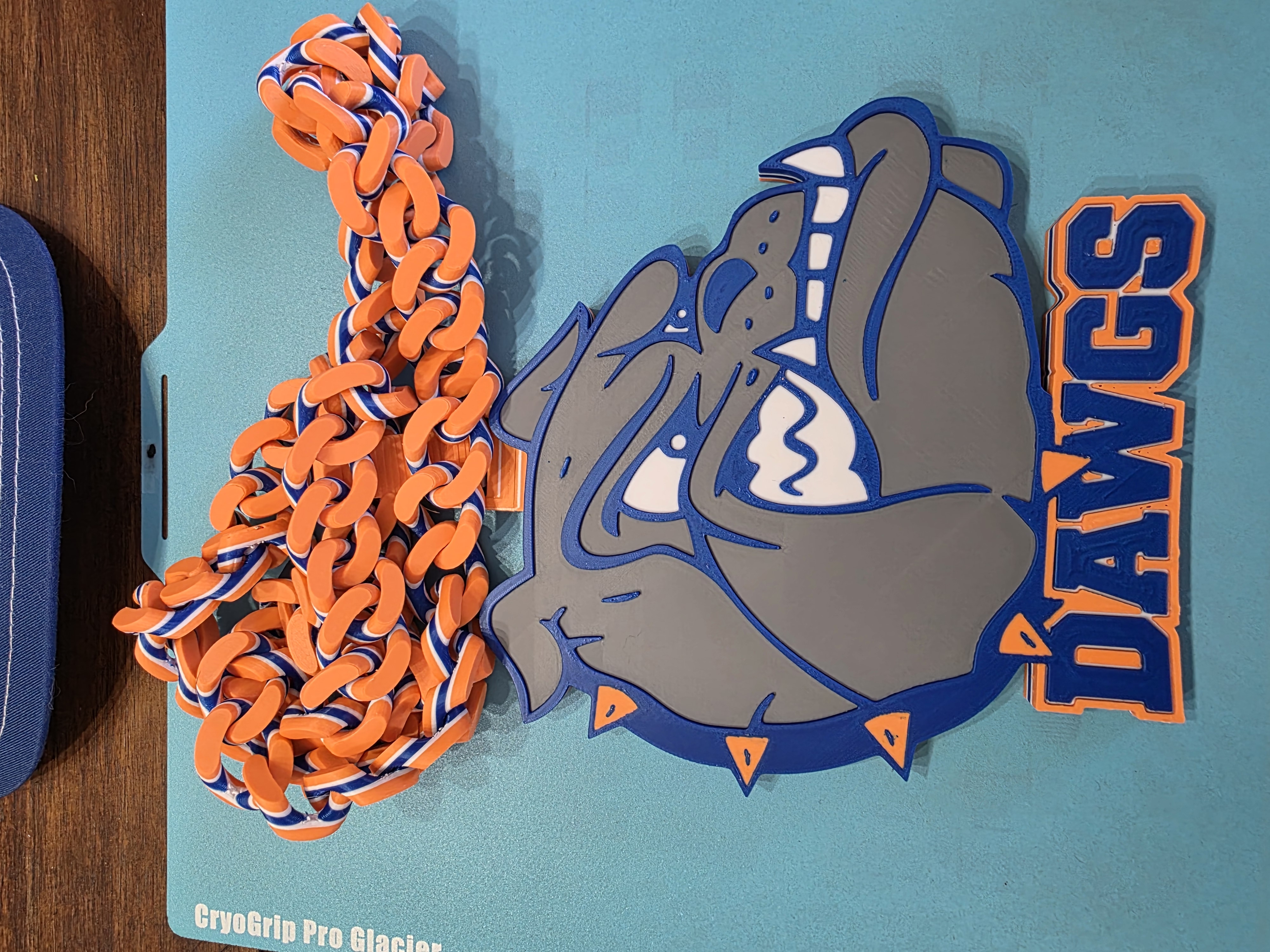 Bulldog Dawgs pendant with an orange, blue, and white printed chain