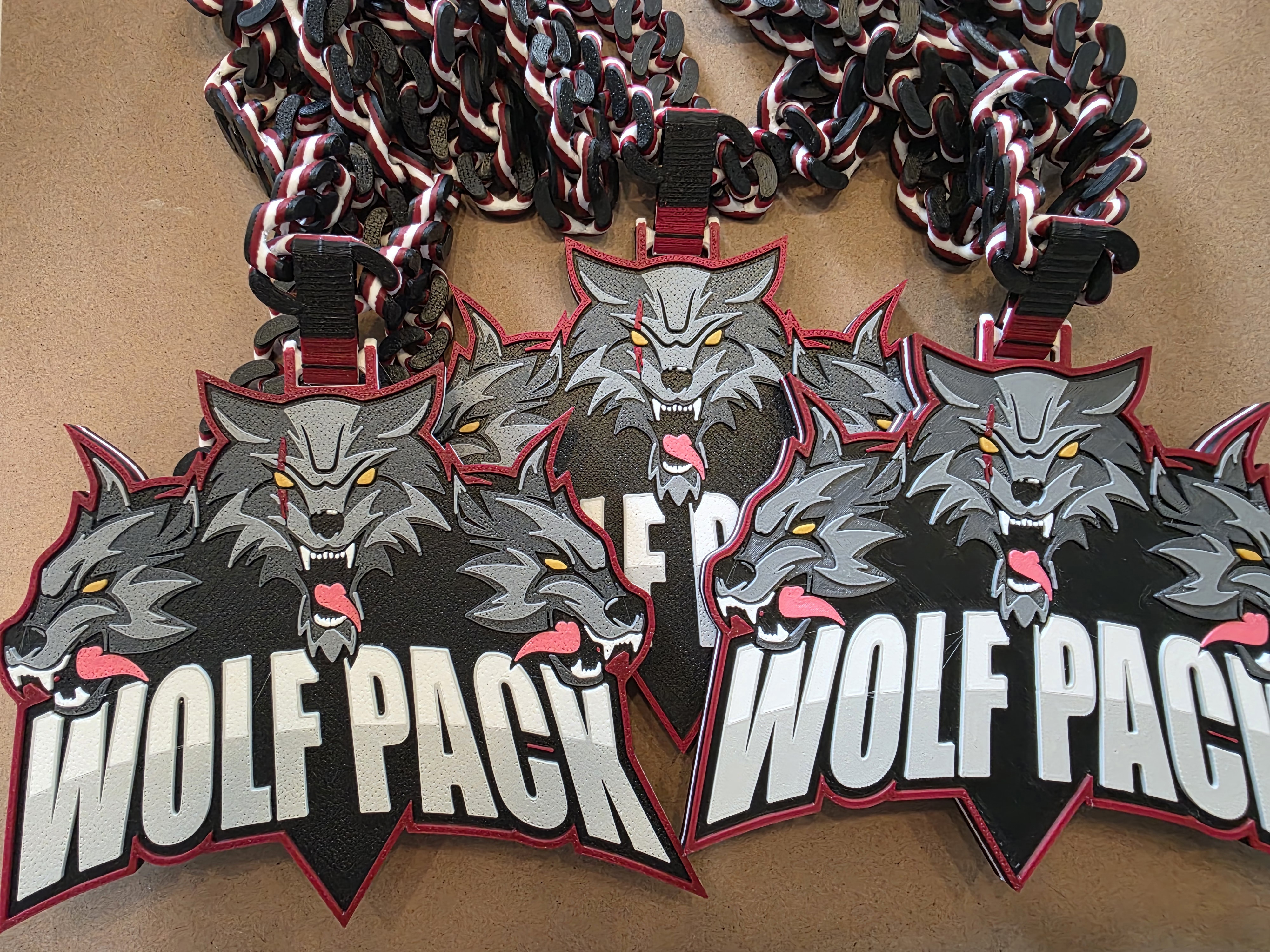Wolfpack pendant with matching printed chain.